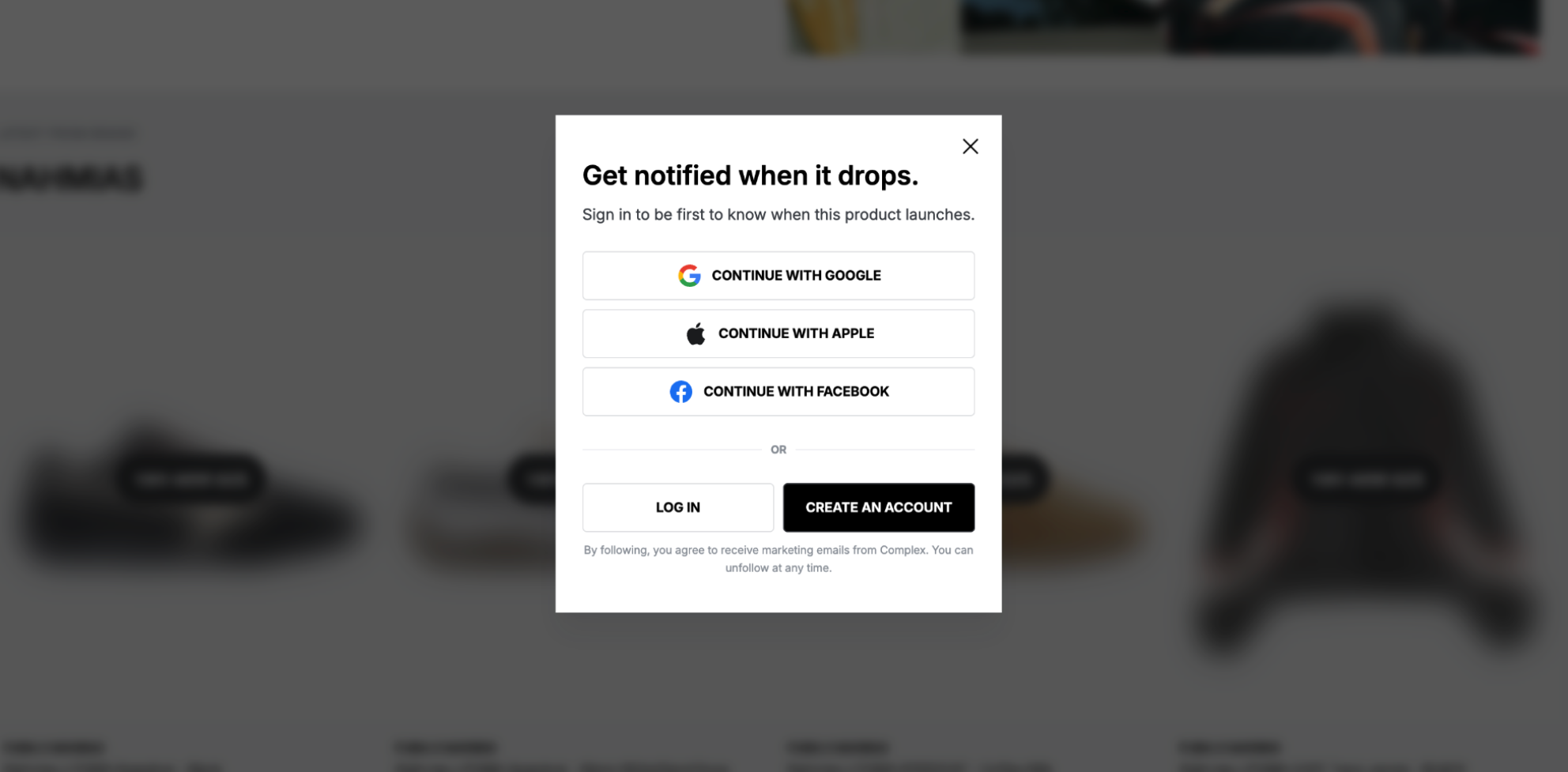 The notify-me sign-in panel over the pre-launch KAWS × MLB storefront.