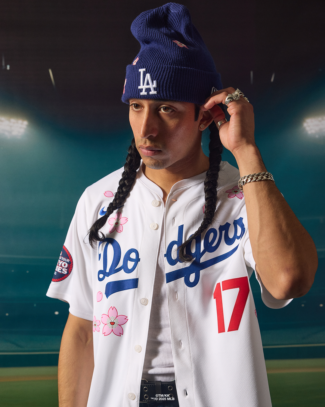 Campaign photograph of a floral Dodgers jersey and knit cap.